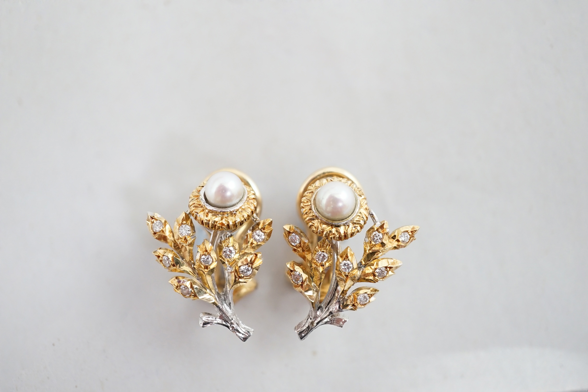 A pair of 1990's Italian Frederico Buccellati 18k gold, single stone pearl and diamond cluster set earrings